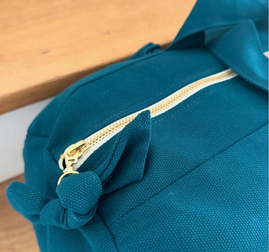 Sac Polochon "Globe Trotteuse" bleu paon