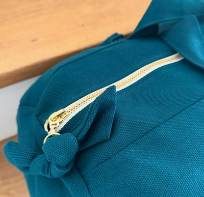 Sac Polochon "Voyage au bout du monde" bleu paon